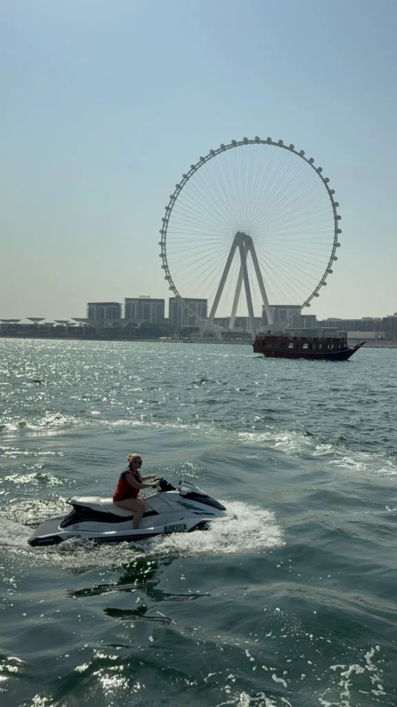 Jet ski ride next to a yacht near JBR Dubai