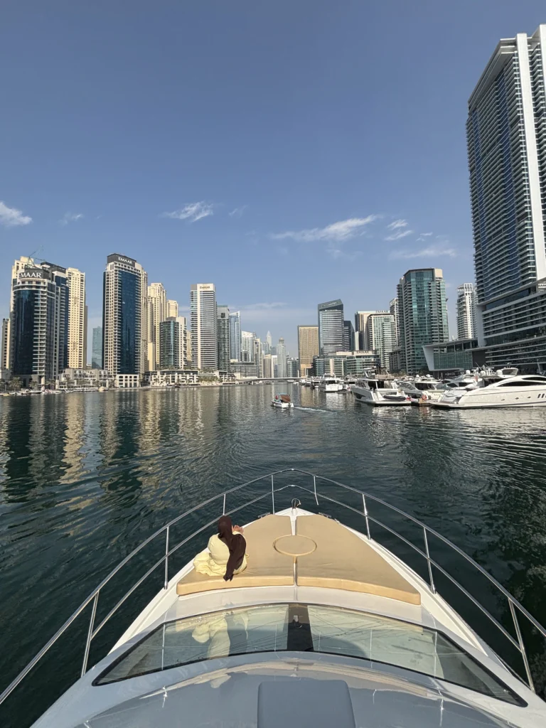 Dubai Marina skyline at night from a yacht